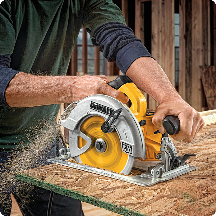 Man cutting wood with DEWALT 7-1/4 Inch 24T Carbide Thin Kerf Framing Circular Saw Blade
